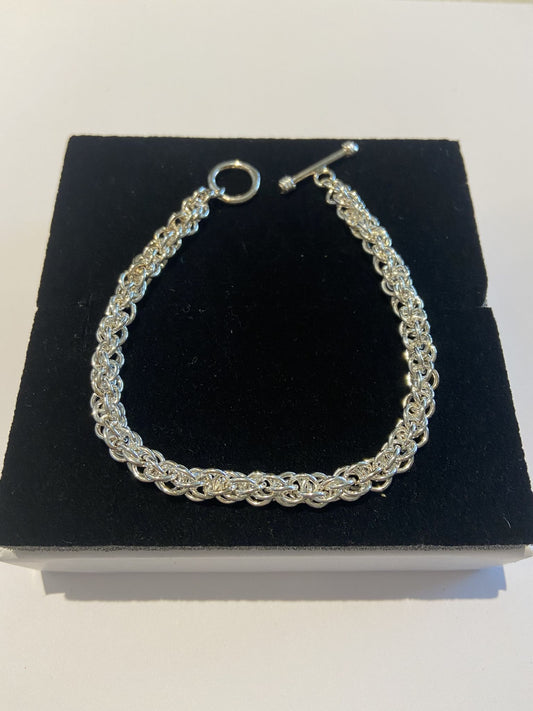 Silver Bracelet Small Rings entwined to make a beautiful design