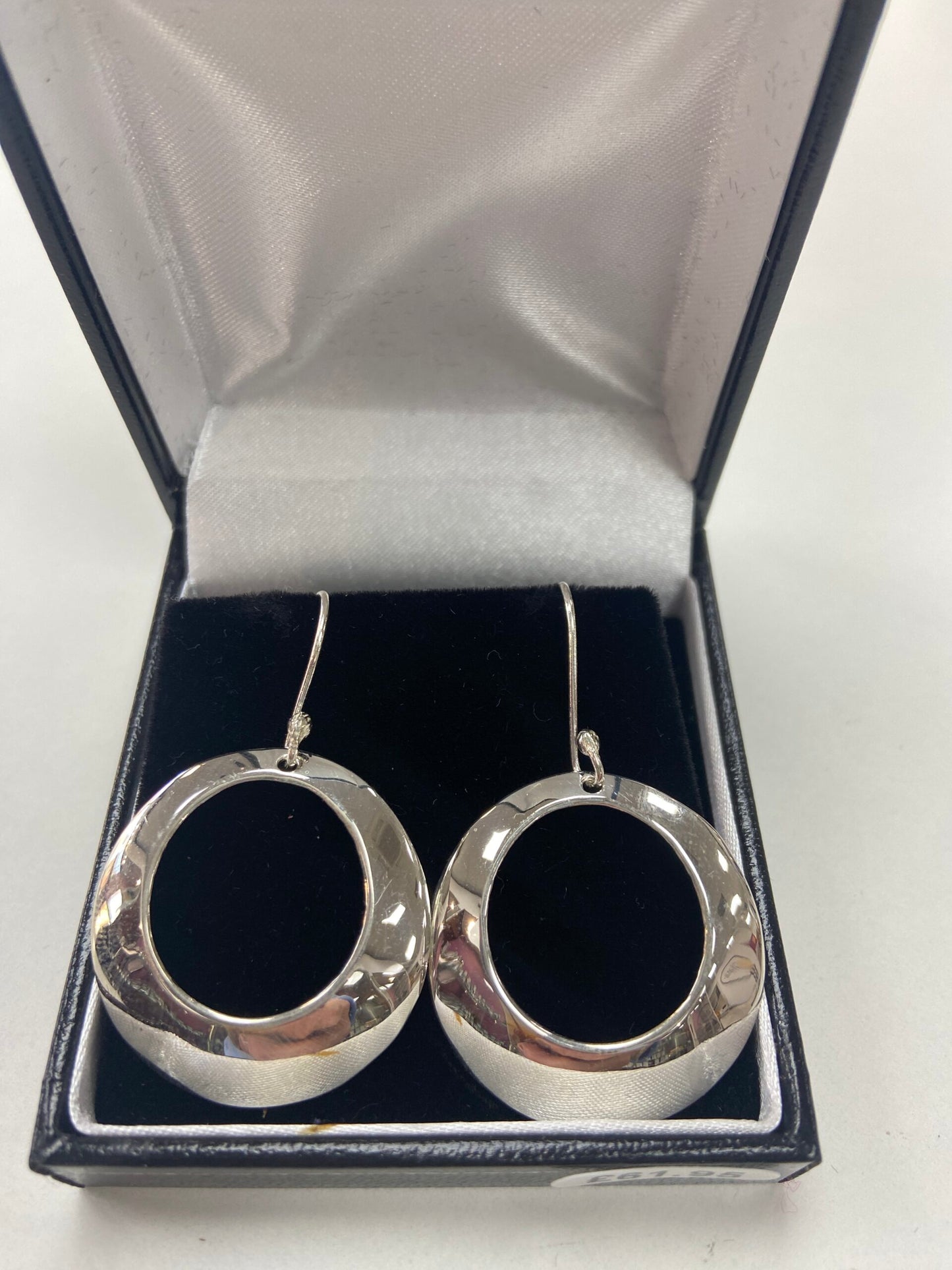 Silver Circle Dangly Earrings